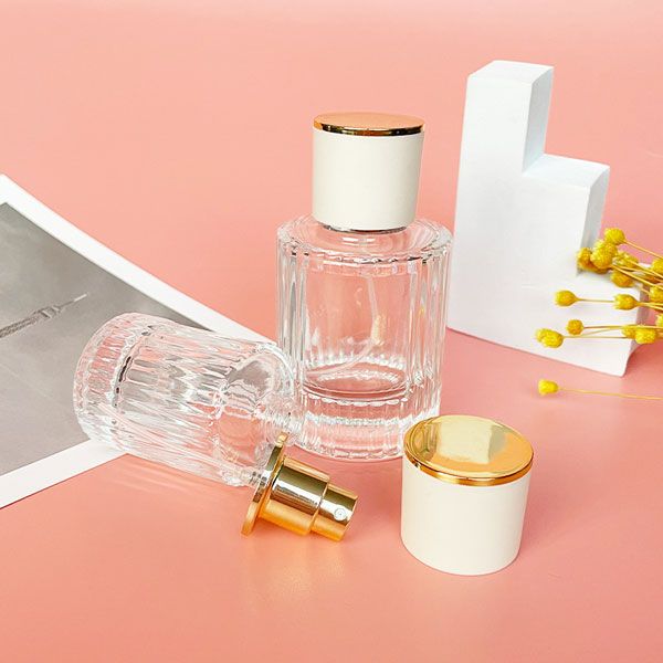 Wholesale luxury cylindrical vertical pattern glass spray perfume bottles