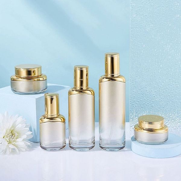 Wholesale luxury golden cosmetic glass bottles