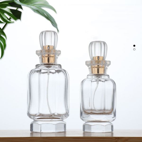Portable 50ml/100ml perfume packing bottles custom press pump spray glass bottles